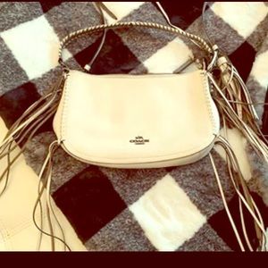 Coach Winter White fringe crossbody/shoulder bag.